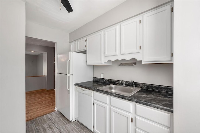 155 Spruce Ct, Ross Twp, PA 15229 - kitchen featuring white appliances, dark countertops, white cabinets, and light wood-type flooring