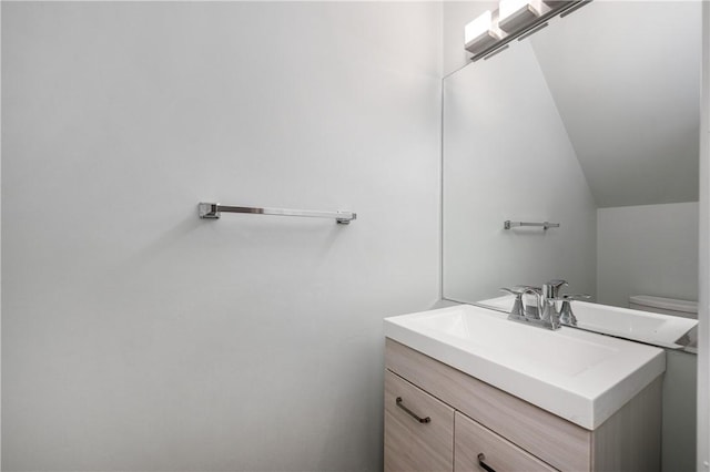 155 Spruce Ct, Ross Twp, PA 15229 - bathroom featuring vanity and lofted ceiling