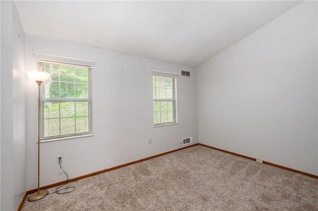 155 Spruce Ct, Ross Twp, PA 15229 - carpeted empty room featuring baseboards and lofted ceiling