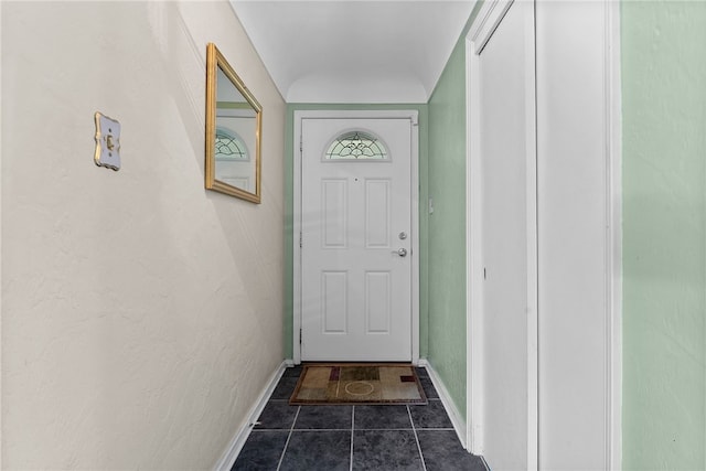 1228 Pinewood Dr, Mt Lebanon, PA 15243 - doorway to outside with baseboards and dark tile patterned floors
