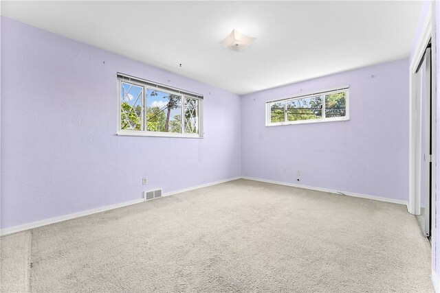 1228 Pinewood Dr, Mt Lebanon, PA 15243 - carpeted empty room with baseboards