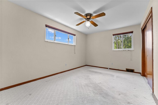 1228 Pinewood Dr, Mt Lebanon, PA 15243 - unfurnished bedroom with multiple windows, carpet floors, and a closet