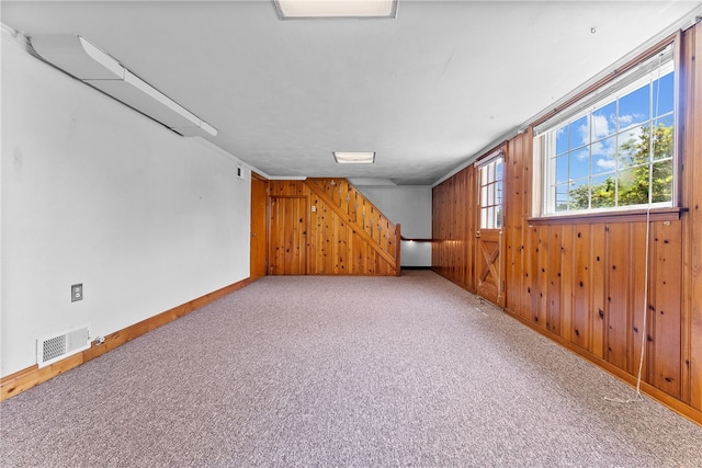 1228 Pinewood Dr, Mt Lebanon, PA 15243 - below grade area featuring wood walls, light carpet, and stairway
