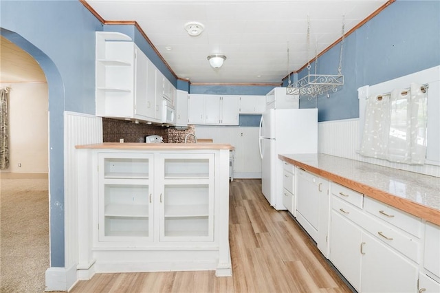 669 Franklin St, Cherryhll Twp/Clymer, PA 15728 - kitchen with white appliances, arched walkways, white cabinetry, open shelves, and wainscoting