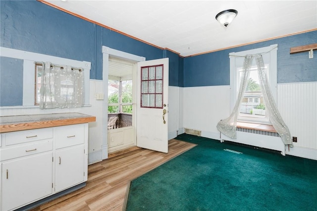 669 Franklin St, Cherryhll Twp/Clymer, PA 15728 - spare room with radiator, light wood-type flooring, and wainscoting