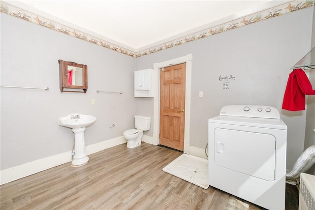669 Franklin St, Cherryhll Twp/Clymer, PA 15728 - laundry room featuring washer / dryer and light wood-style floors