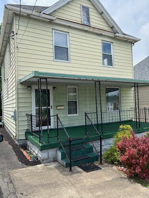 104 Whyle Ave, North Union Twp, PA 15401 - view of front facade featuring covered porch