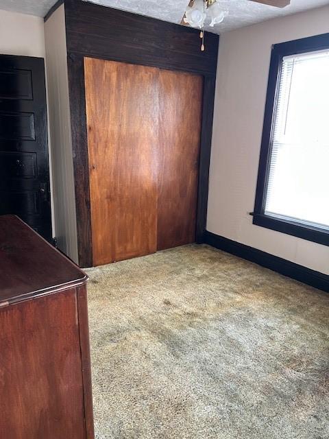 104 Whyle Ave, North Union Twp, PA 15401 - empty room featuring carpet and a ceiling fan