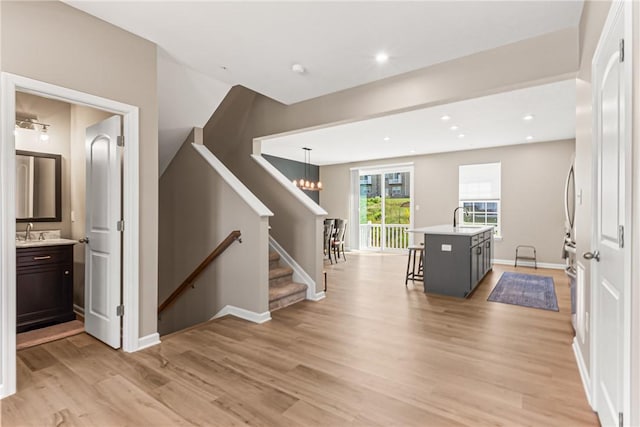 136 Sweetwater Dr, Moon/Crescent Twp, PA 15108 - interior space with light wood-style floors and a chandelier