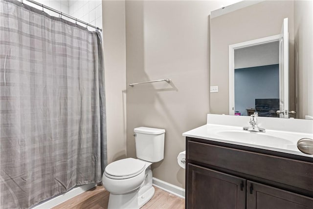 136 Sweetwater Dr, Moon/Crescent Twp, PA 15108 - bathroom featuring wood finished floors, vanity, and a shower with curtain