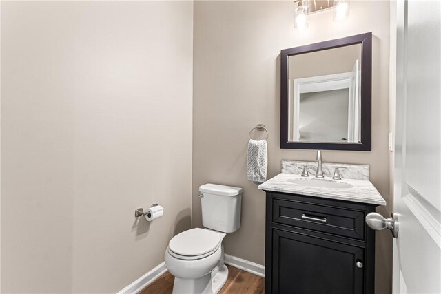 136 Sweetwater Dr, Moon/Crescent Twp, PA 15108 - bathroom featuring wood finished floors and vanity