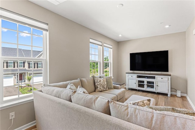 136 Sweetwater Dr, Moon/Crescent Twp, PA 15108 - living area featuring wood finished floors and recessed lighting