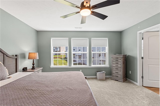 136 Sweetwater Dr, Moon/Crescent Twp, PA 15108 - bedroom with carpet floors and ceiling fan