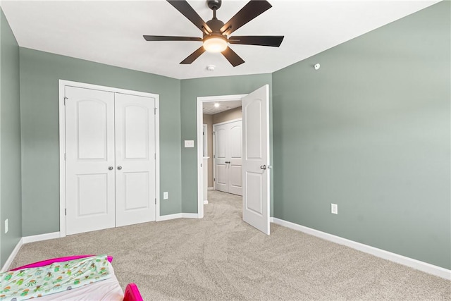 136 Sweetwater Dr, Moon/Crescent Twp, PA 15108 - unfurnished bedroom featuring light colored carpet, a closet, and a ceiling fan