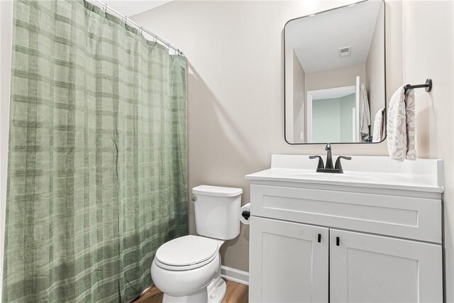 136 Sweetwater Dr, Moon/Crescent Twp, PA 15108 - full bathroom with vanity, wood finished floors, and a shower with curtain