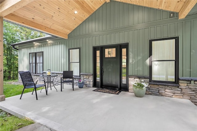 521 Creek Rd, Smith, PA 15019 - entrance to property featuring stone siding, a patio, and board and batten siding