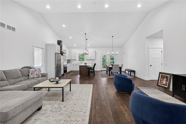 521 Creek Rd, Smith, PA 15019 - living area with high vaulted ceiling, a chandelier, dark wood finished floors, and recessed lighting