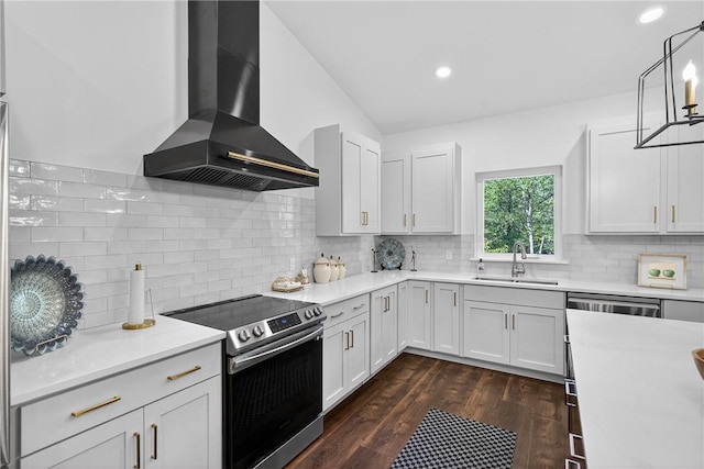 521 Creek Rd, Smith, PA 15019 - kitchen featuring electric stove, wall chimney exhaust hood, light countertops, dark wood finished floors, and decorative backsplash