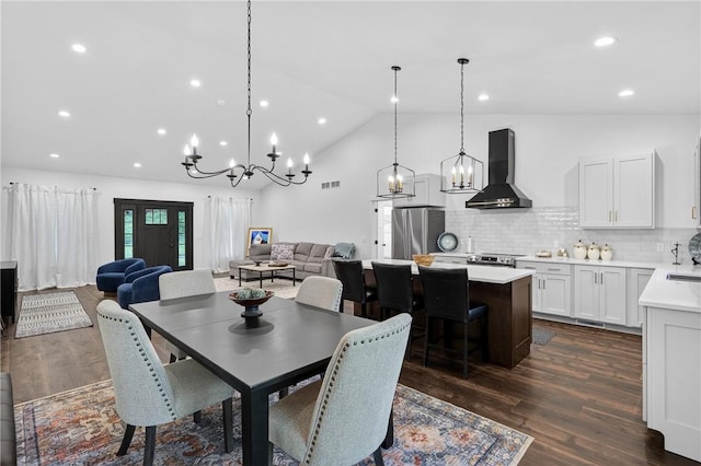521 Creek Rd, Smith, PA 15019 - dining room with dark wood-style flooring, a chandelier, recessed lighting, and high vaulted ceiling
