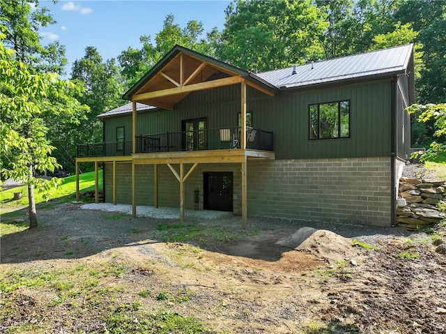 521 Creek Rd, Smith, PA 15019 - view of front of house featuring a metal roof and a wooden deck