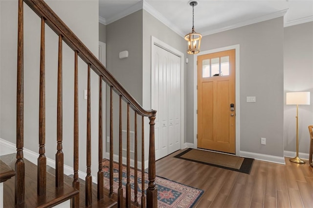 403 Cayuga Cir, Marshall, PA 16046 - foyer entrance with stairs, wood finished floors, and ornamental molding