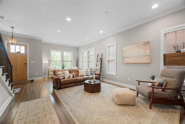 403 Cayuga Cir, Marshall, PA 16046 - living area featuring wood finished floors, ornamental molding, stairs, healthy amount of natural light, and recessed lighting