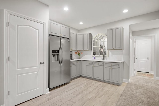 403 Cayuga Cir, Marshall, PA 16046 - kitchen with stainless steel refrigerator with ice dispenser, gray cabinets, light countertops, light wood-type flooring, and recessed lighting