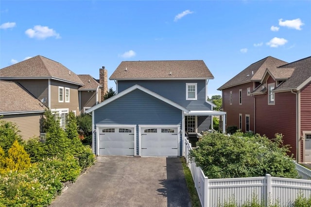 403 Cayuga Cir, Marshall, PA 16046 - traditional-style house featuring asphalt driveway and an attached garage