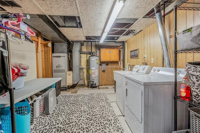 360 Jo Ann Dr, Monessen, PA 15062 - laundry area featuring gas water heater, separate washer and dryer, wooden walls, and heating unit
