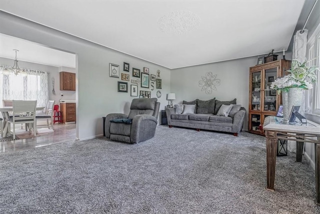 360 Jo Ann Dr, Monessen, PA 15062 - carpeted living area with a chandelier