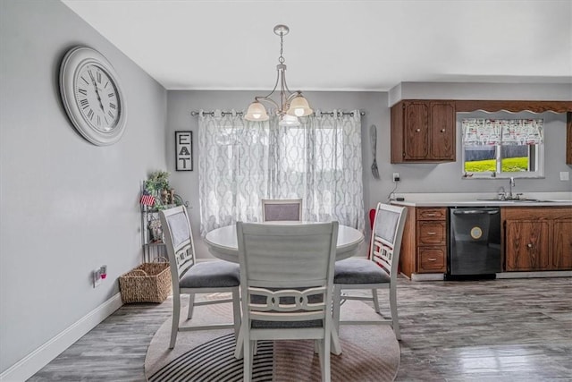 360 Jo Ann Dr, Monessen, PA 15062 - dining area featuring a chandelier and light wood finished floors