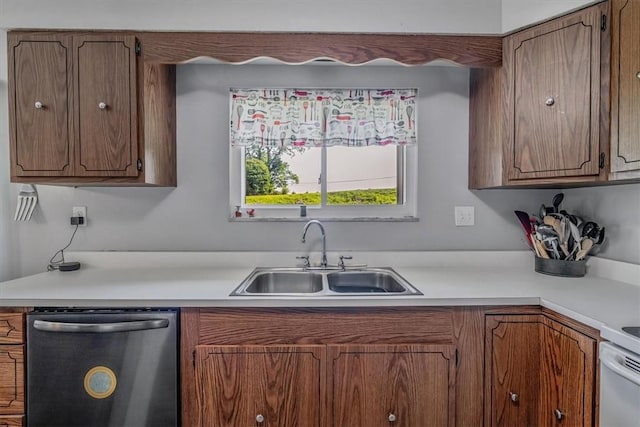 360 Jo Ann Dr, Monessen, PA 15062 - kitchen featuring dishwasher, light countertops, and brown cabinets