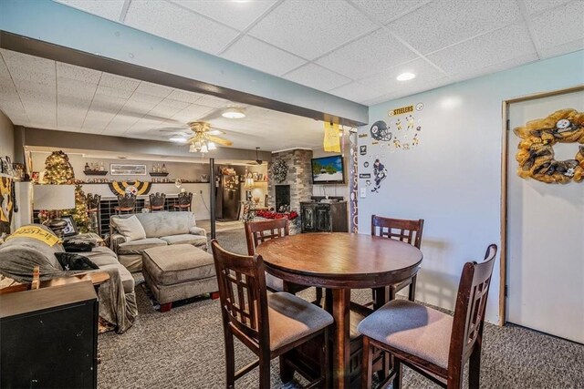 360 Jo Ann Dr, Monessen, PA 15062 - carpeted dining room with a paneled ceiling and a ceiling fan