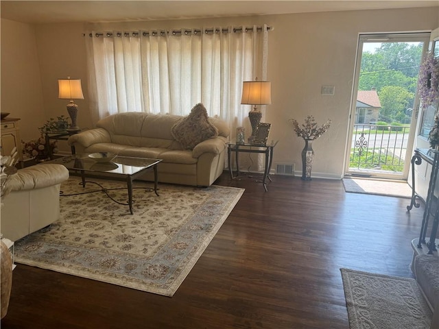 5301 Ranchview Dr, Baldwin Boro, PA 15236 - living room with healthy amount of natural light and dark wood finished floors