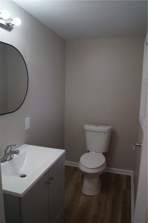 9 E Gaskill Ave, Jeannette, PA 15644 - bathroom with wood finished floors and vanity