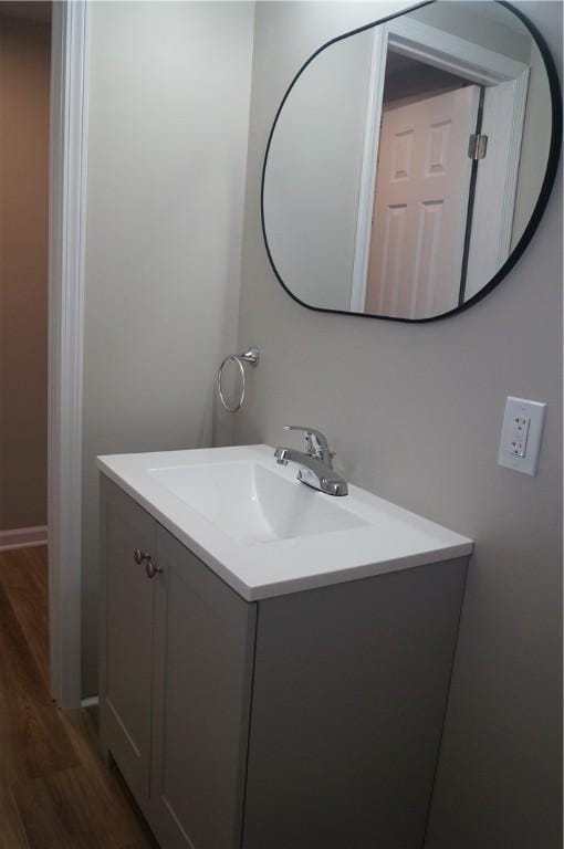 9 E Gaskill Ave, Jeannette, PA 15644 - bathroom featuring wood finished floors and vanity