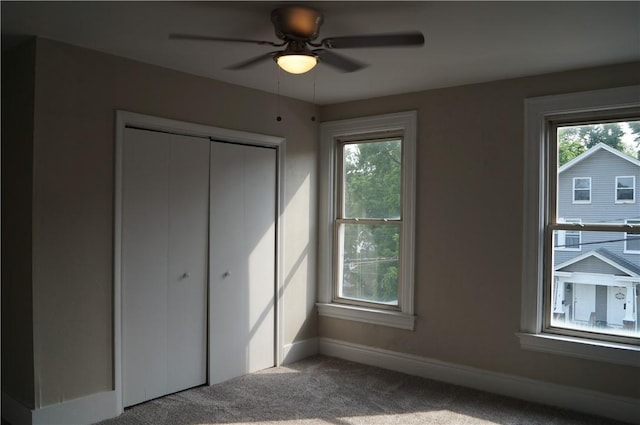 9 E Gaskill Ave, Jeannette, PA 15644 - unfurnished bedroom featuring carpet, a closet, and ceiling fan