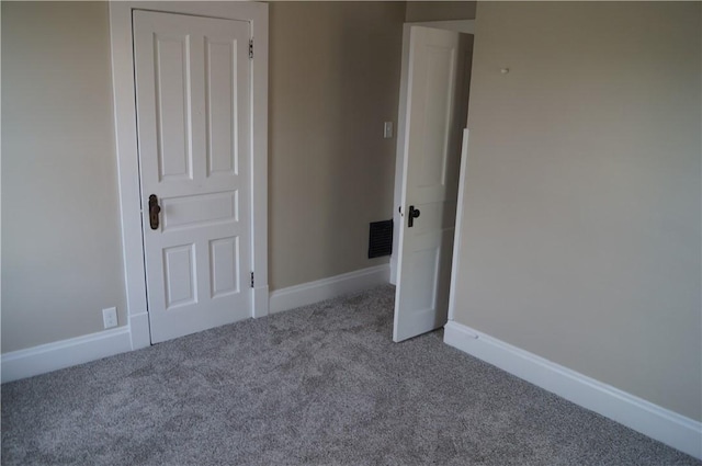 9 E Gaskill Ave, Jeannette, PA 15644 - unfurnished bedroom with carpet and baseboards