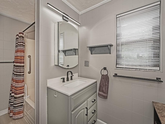 165 Monks Rd, Clinton Twp, PA 16056 - full bath with vanity, tile walls, ornamental molding, shower / bath combo, and a textured ceiling