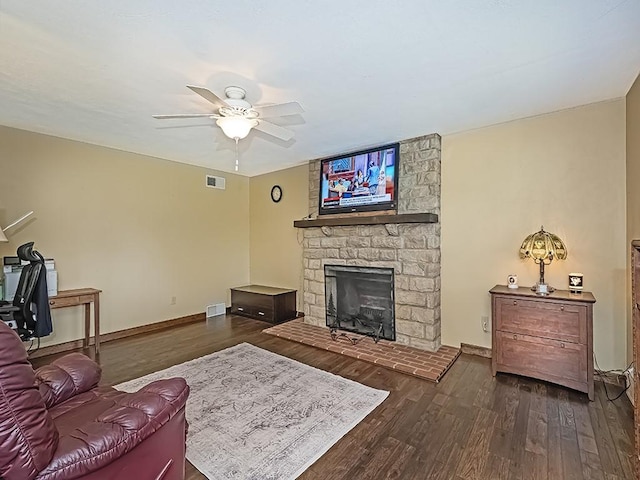 165 Monks Rd, Clinton Twp, PA 16056 - living room featuring wood finished floors, a ceiling fan, and a fireplace