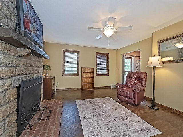 165 Monks Rd, Clinton Twp, PA 16056 - living area featuring a ceiling fan, healthy amount of natural light, and dark wood-style flooring