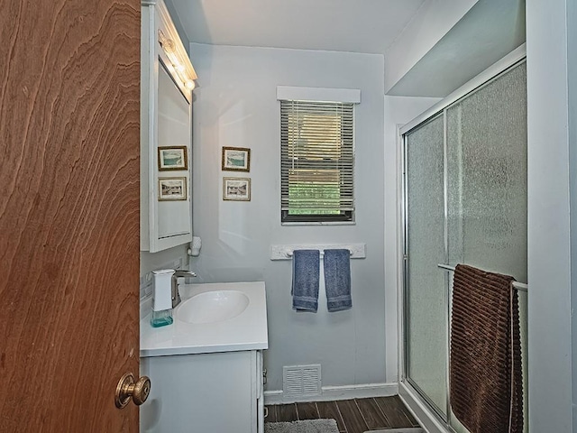 165 Monks Rd, Clinton Twp, PA 16056 - bathroom featuring vanity, a stall shower, and wood finished floors