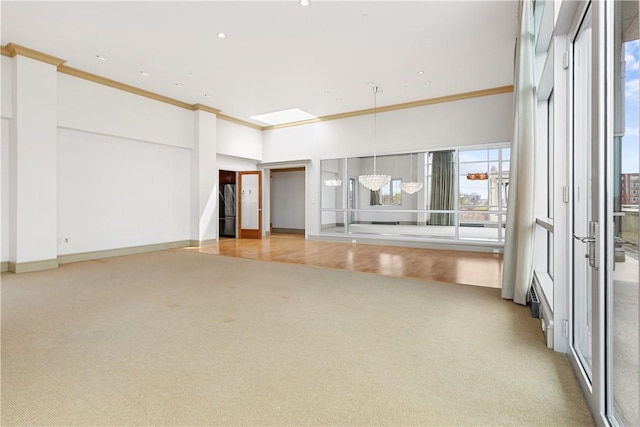 537 N Neville St Unit 6A, Shadyside, PA 15213 - empty room with plenty of natural light, light carpet, a towering ceiling, crown molding, and recessed lighting