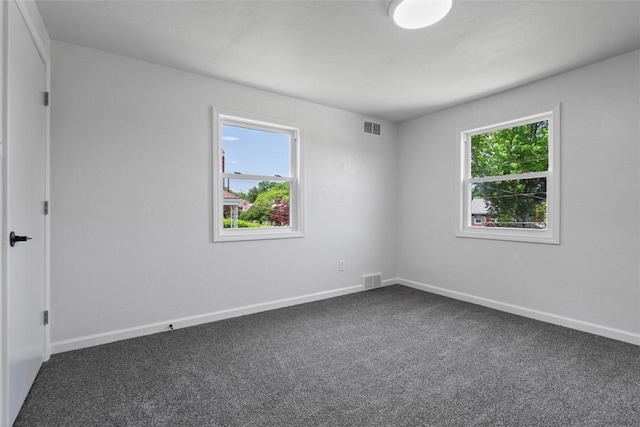 4736 Doyle Rd, Whitehall, PA 15227 - unfurnished room featuring dark colored carpet and baseboards