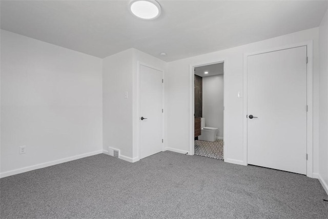 4736 Doyle Rd, Whitehall, PA 15227 - unfurnished bedroom with carpet flooring and connected bathroom