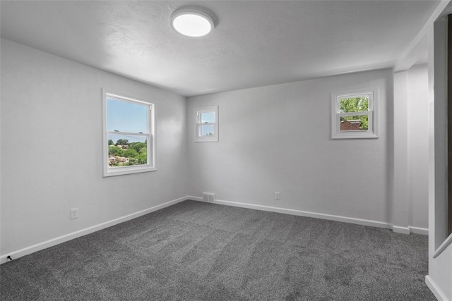 4736 Doyle Rd, Whitehall, PA 15227 - empty room featuring dark colored carpet