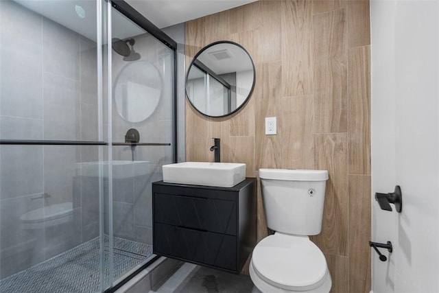 4736 Doyle Rd, Whitehall, PA 15227 - bathroom with tile walls, a stall shower, and vanity