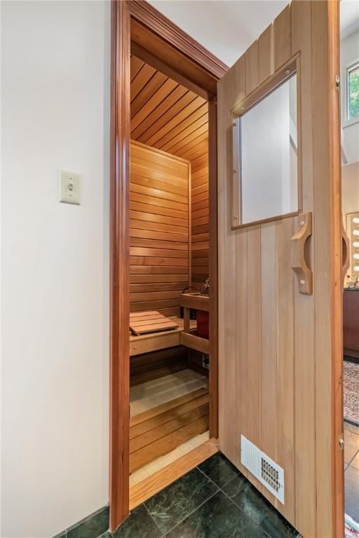 337 Fox Chapel Rd, Fox Chapel, PA 15238 - relaxing sauna with wood walls and tile patterned floors