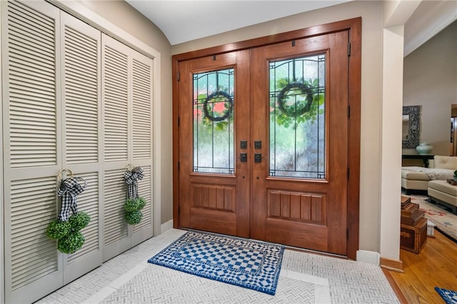 337 Fox Chapel Rd, Fox Chapel, PA 15238 - entrance foyer with french doors and light wood finished floors