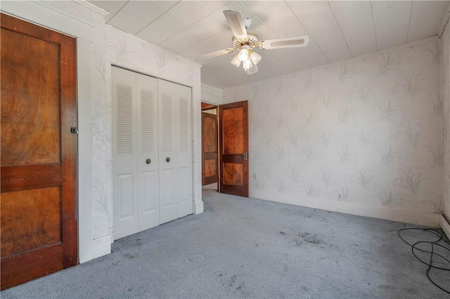 1518 Carlisle St, Natrona Hts/Harrison Twp, PA 15065 - unfurnished bedroom with wallpapered walls, carpet, a closet, and a ceiling fan